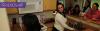 Photo of students in a kitchen in a student apartment with the text "friendship" on it