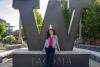 Madilyn Pawlowski stands in front of the big W on campus
