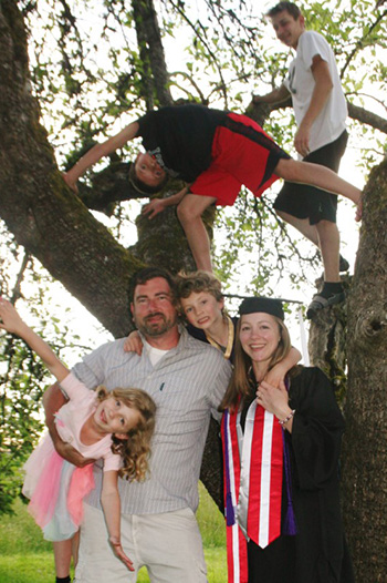Nataly Herrman, '20, B.A. Psychology, at lower right, with family