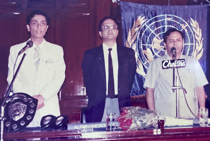At 21, Altaf Merchant chaired a Model United Nations Security Council event in Mumbai. He is at left above, with Rotary International member Gulam Vahanvaty (center) and Education Minister P. Kadam (right).