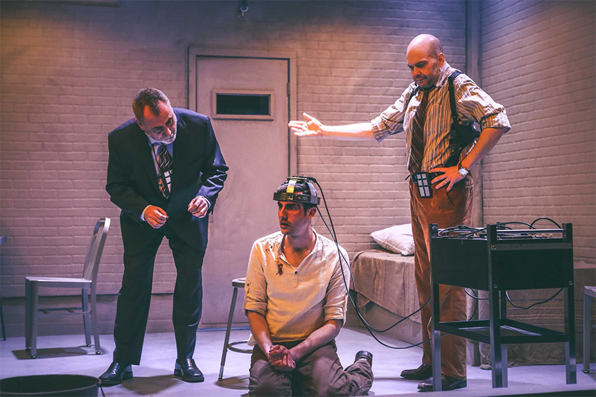 Andrew Fry, at left, as Tupolski, a police detective interrogating a writer of short stories, in a production of "The Pillowman" at Tacoma Little Theater.