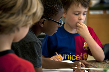 Kids studying in classroom