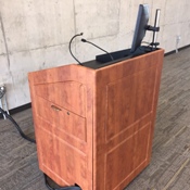 Cherry wood podium with computer, microphone, and document light 