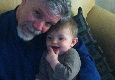 UW Tacoma Professor of Social Work Charles Emlet with grandchild