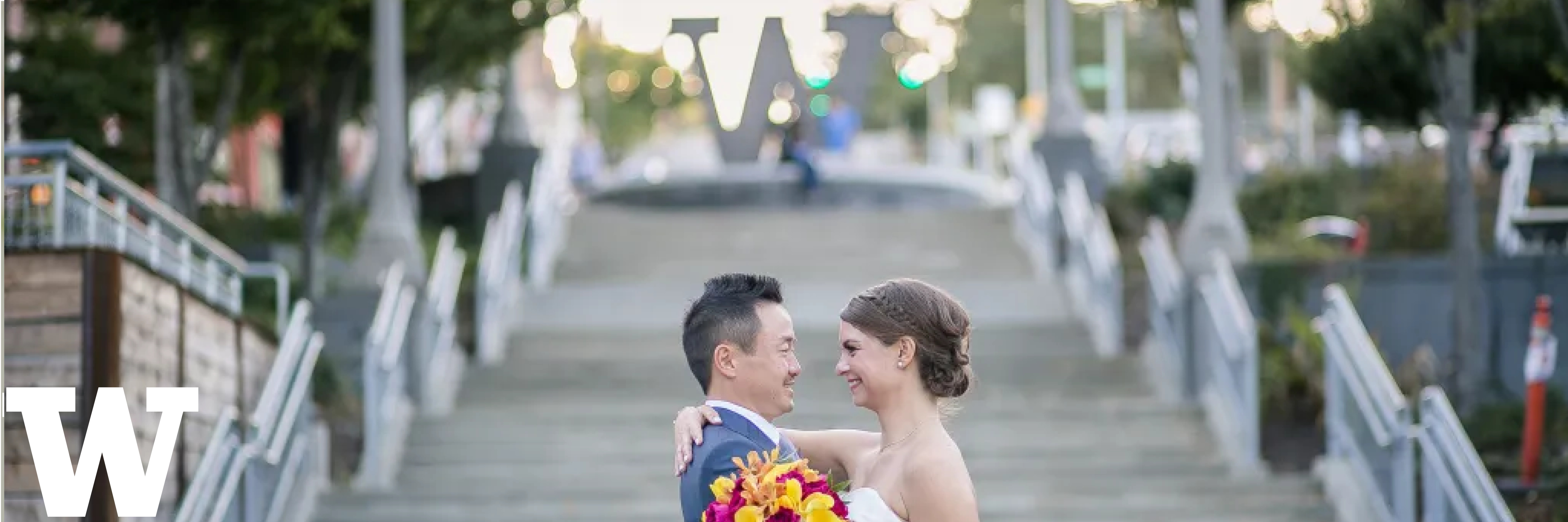 groom and bride at UW Tacoma steps