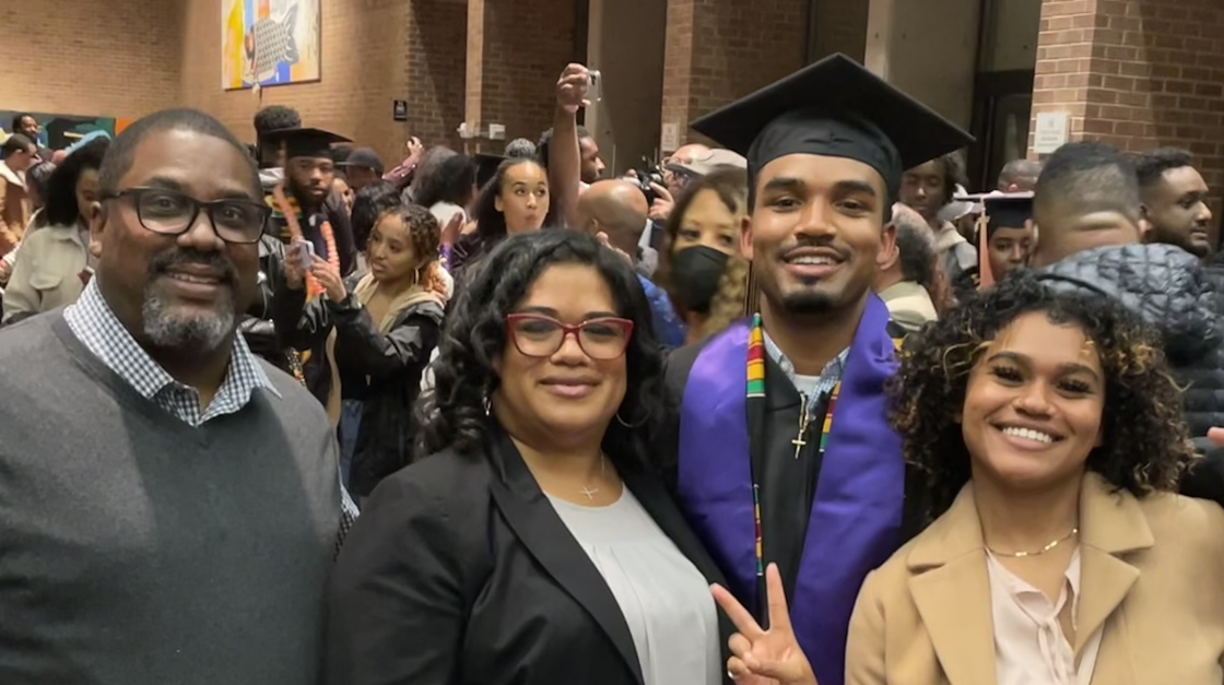 Leland Adams with Family at UW Black Graduation 2022 Event