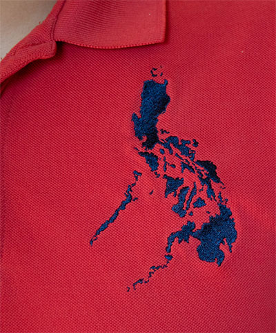 Embroidered map of Philippines archipelago on shirt of Dr. Paolo Laraño.