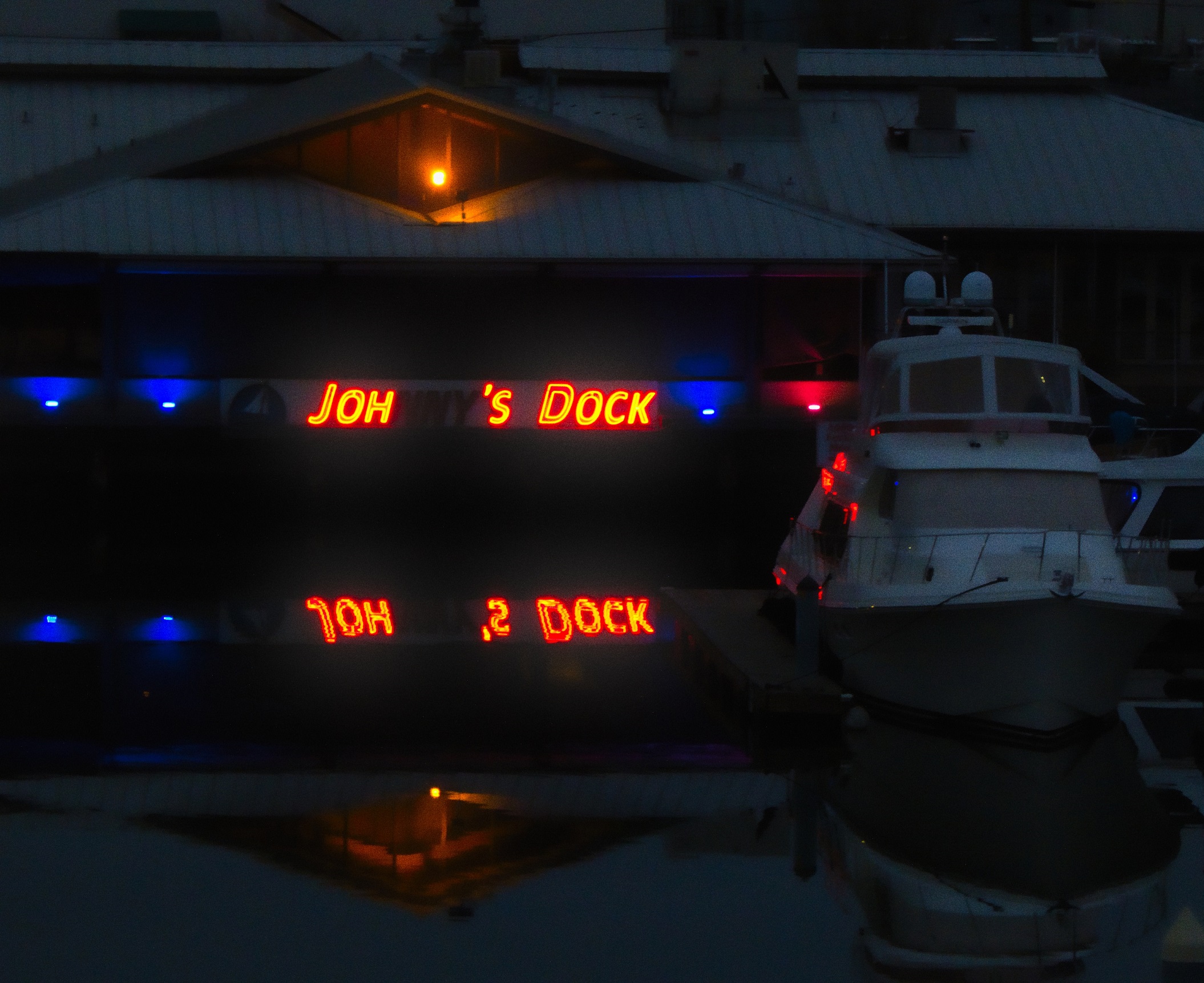 Pictured: A boat dock in the port of Tacoma, at night.