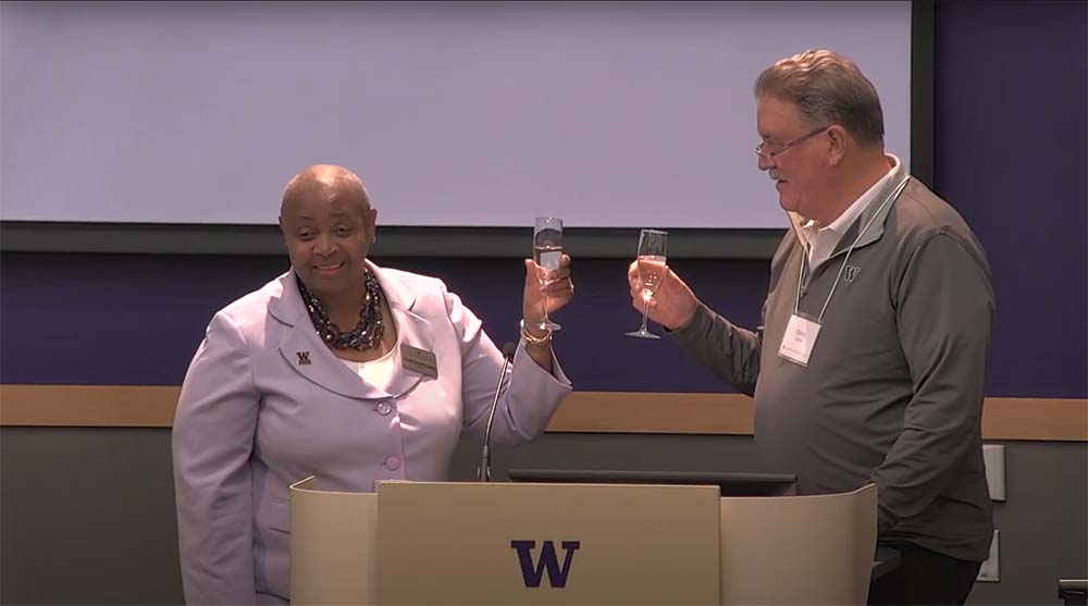 UW Tacoma Chancellor Sheila Edwards Lange raises a toast to Tacoma's future with UW Regent Dave Zeeck during a 2022 event on the UW Tacoma campus.