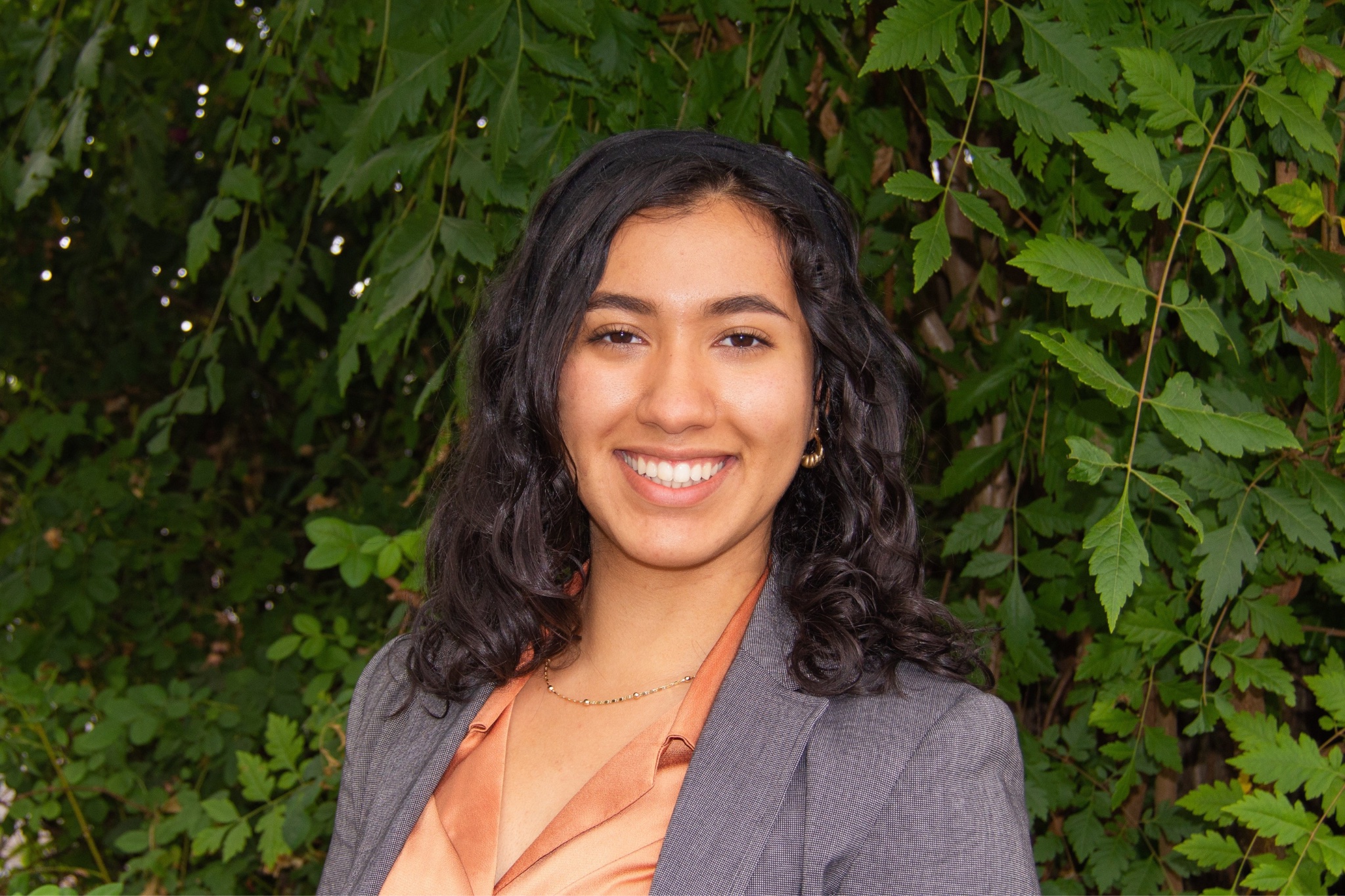 Person writing in a notebook while traveling