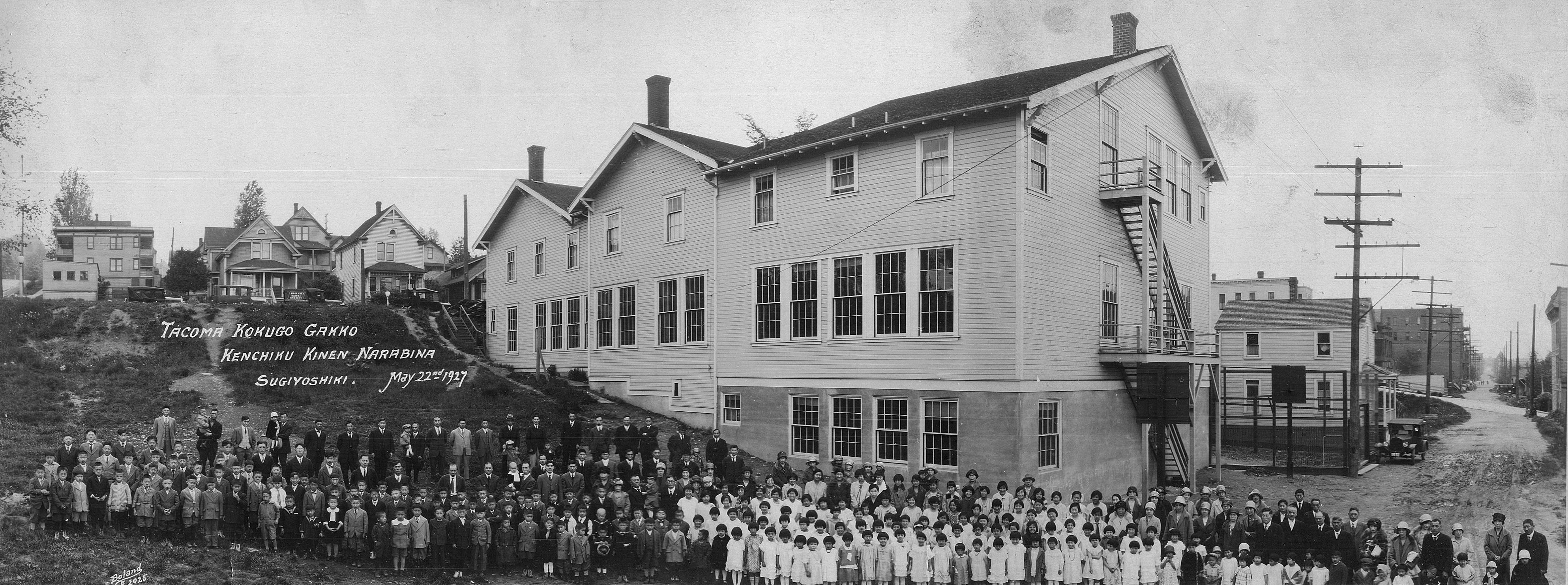 Photo of students and faculty of the Tacoma Japanese Language School standing in front of the building in 1927 