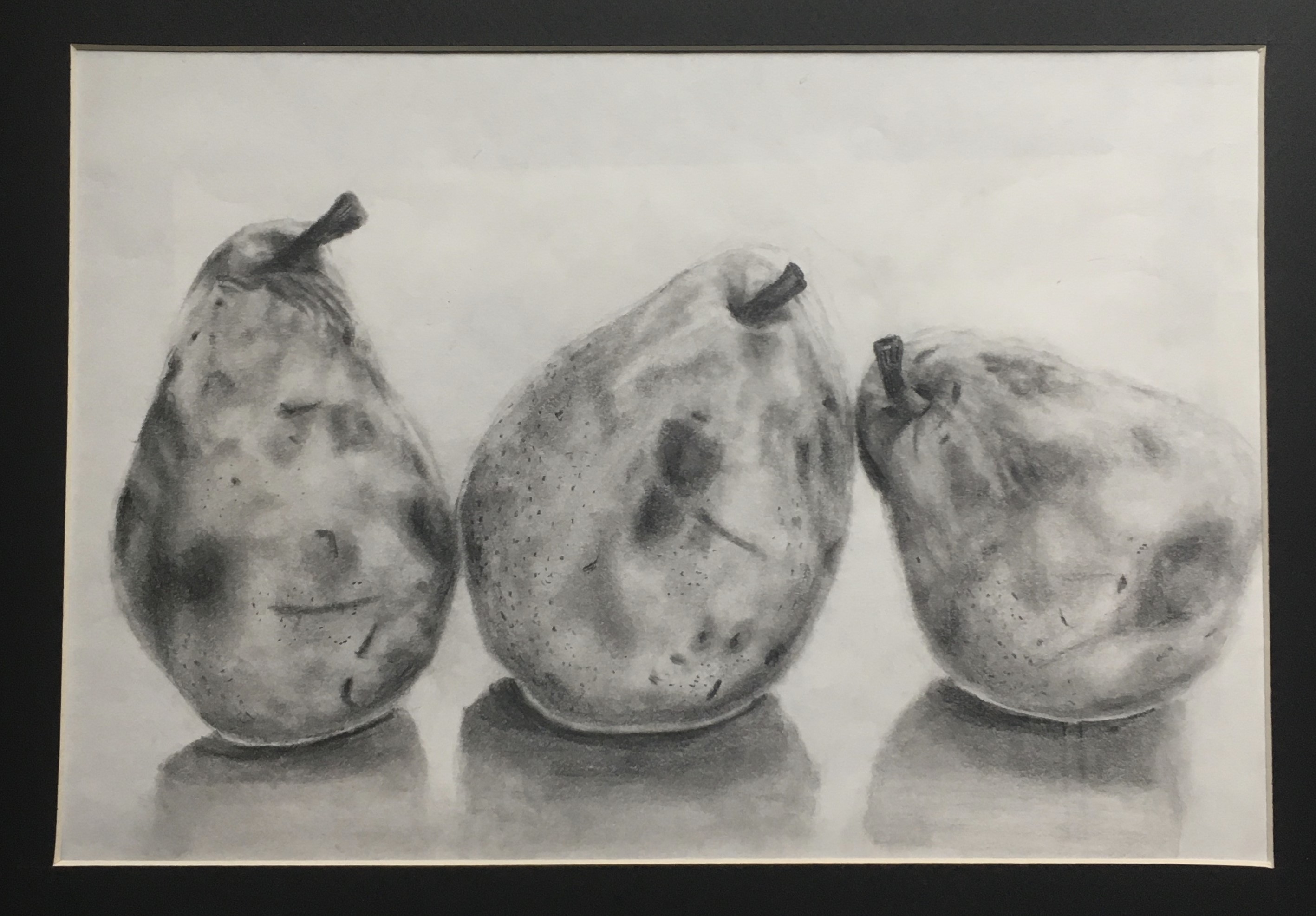 An illustration of three pears.