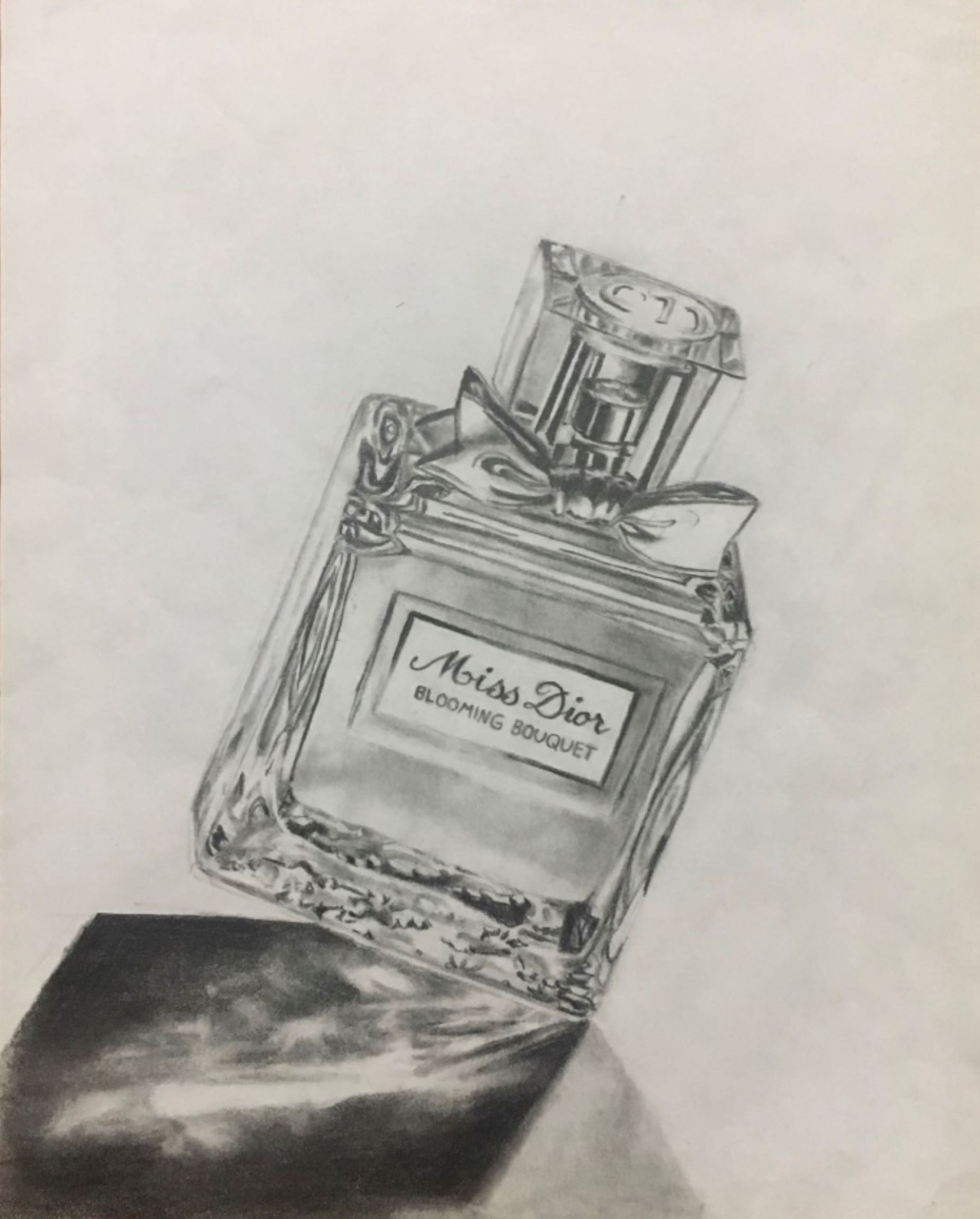 Pictured: An illustration of ab ottle of Miss Dior perfume and its shadow.