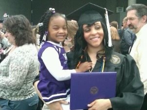 Courtney Acoff, '10, at graduation with daughter