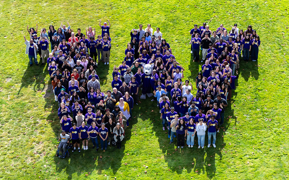UW Tacoma students, faculty and staff gather for the campus’s annual “W Photo” on the Court 17 Green
