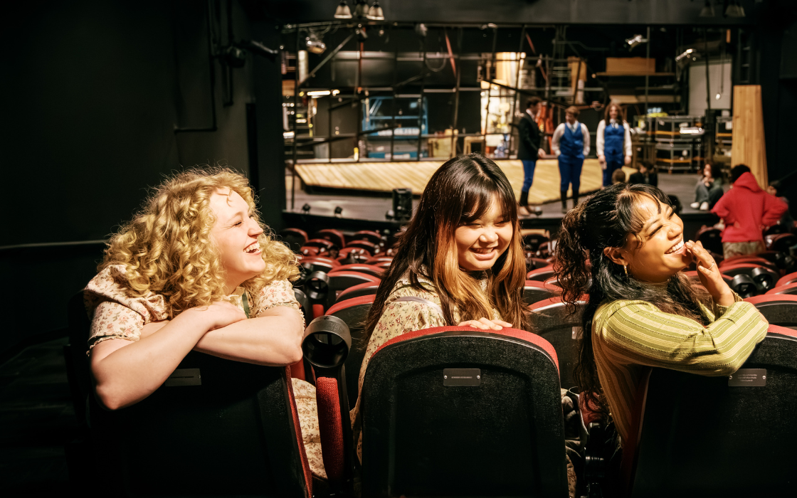 UW Tacoma students of the Spring Awakening ensemble sit in the house of the Tacoma Little Theatre