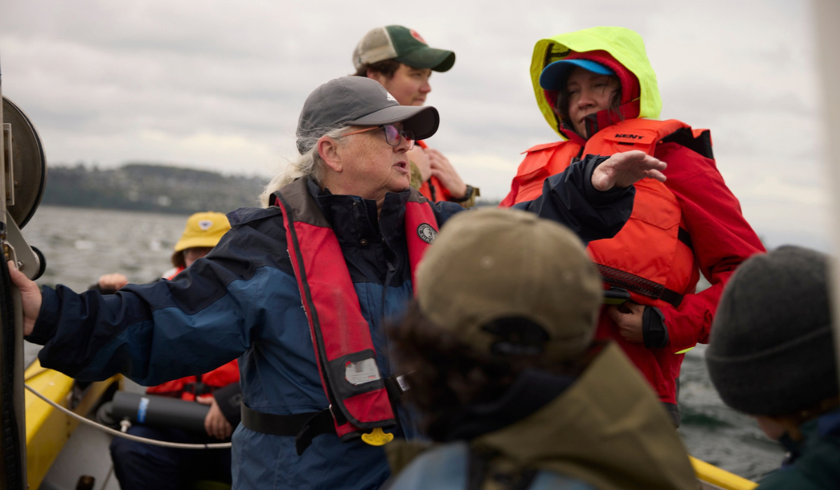 Cheryl Greengrove collects samples on the Puget Sound with students
