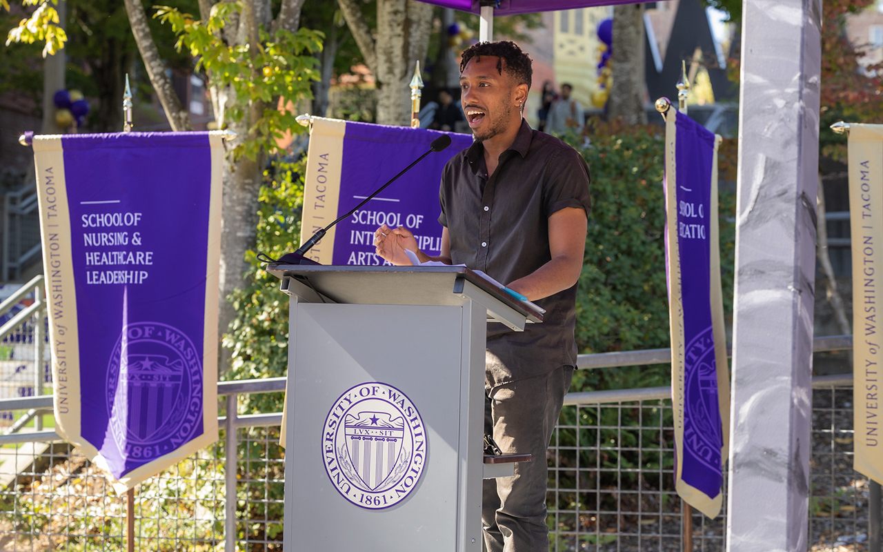 ASUWT President Terrell Stalworth speaks at a podium during UW Tacoma Convocation.