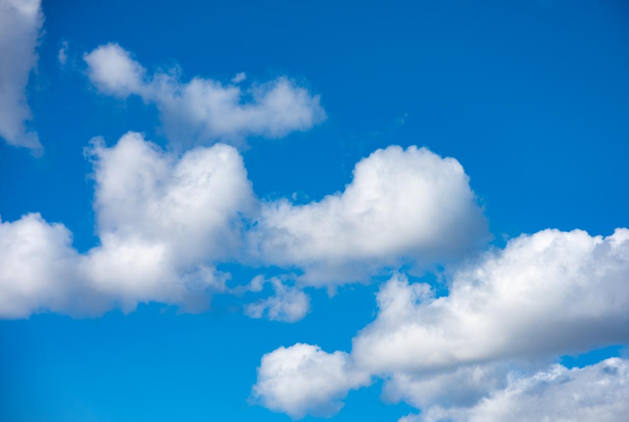 Bright blue sky with clouds