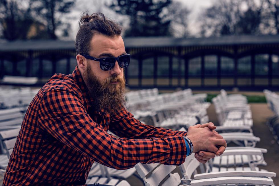 Hipster outdoor seated flannel