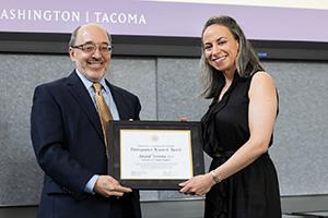 Photo of UW Tacoma Associate Professor Anaid Yerena with Executive Vice Chancellor Andy Harris