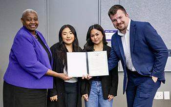 A group photo taken with a statewide proclamation issued by Washington Governor Bob Ferguson