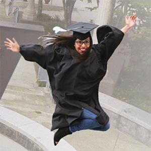 UW Tacoma grad leaping in air