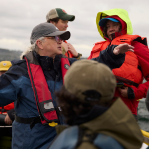 Cheryl Greengrove collects samples on the Puget Sound with students