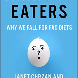Cover of Professor Kima Cargill's new book called "Anxious Eaters: Why We Fall for Fad Diets." The cover is blue and has black and white text. In the middle of the cover is a white egg that has a face on it.