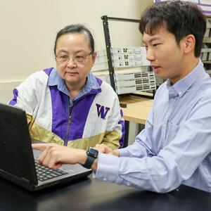 Yan Bai (left) and Zikai Wen (right) collaborate in their lab at UW Tacoma.