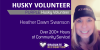 purple husky volunteer