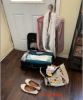 Image of various clothes, shoes, and luggage