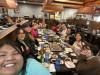 A group of students eating dinner