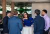 Students mingling with a potential employer at the 2025 business etiquette dinner
