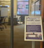 front door with a sign to TLB 115