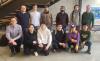 Photo of 12 CSS Ph.D. students and faculty posing for a picture