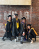 Sage Ahrens-Nichols graduates with classmates and colleagues from the UW Tacoma School of Social Work and Criminal Justice.