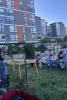 Photo of people sitting outside for presentation
