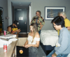 Sage Ahrens-Nichols (center) relaxes in a hotel room with fellow players from Survivor season 49.