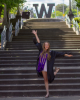 Sage Ahrens-Nichols poses for graduation photos at the bottom of the Grand Staircase with her U.S. Army stole. 