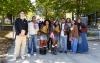 UW Tacoma students pose for a group photo on campus.