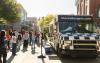Students line up for a food truck serving burgers at UW Tacoma Convocation.