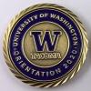 Photo of a challenge coin that says "University of Washington Orientation 2020 and W Tacoma"